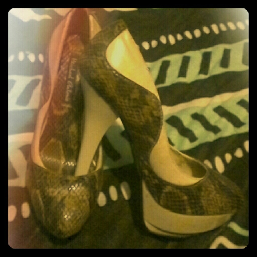 Snakeskin pumps